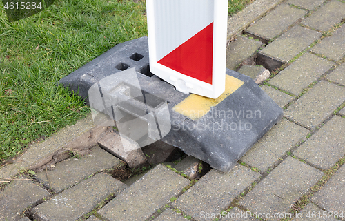 Image of Pavement of paving slabs, requiring repair