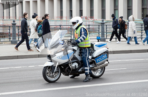 Image of Berlin, Germany - August 31, 2019: German policewoman and her BM
