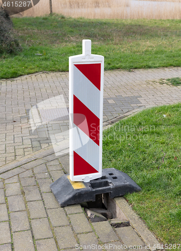 Image of Pavement of paving slabs, requiring repair