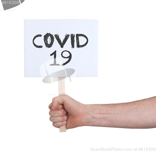 Image of Sign in a hand, isolated on white