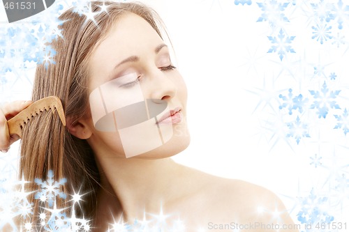 Image of combing beauty