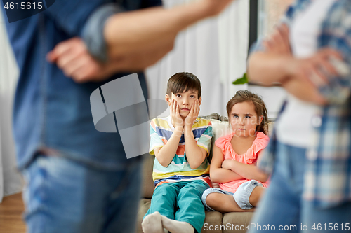 Image of children watching their parents quarreling at home