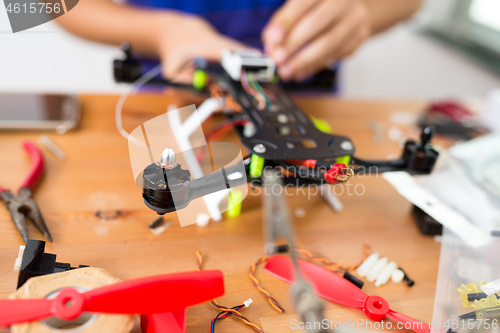 Image of Connecting the component on drone at home