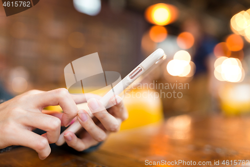 Image of Woman use of mobile phone