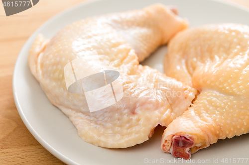 Image of Fresh chicken drumstick close up