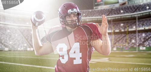 Image of american football player throwing ball