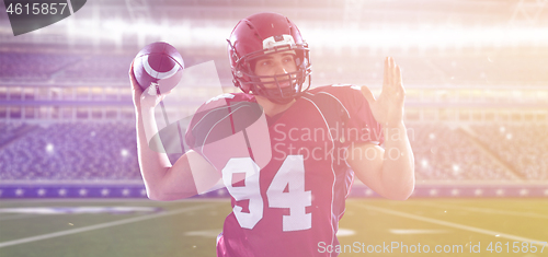 Image of american football player throwing ball