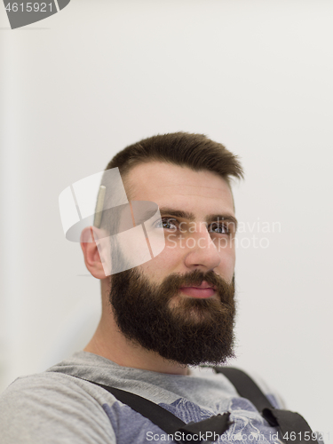 Image of portrait of bearded hipster handyman