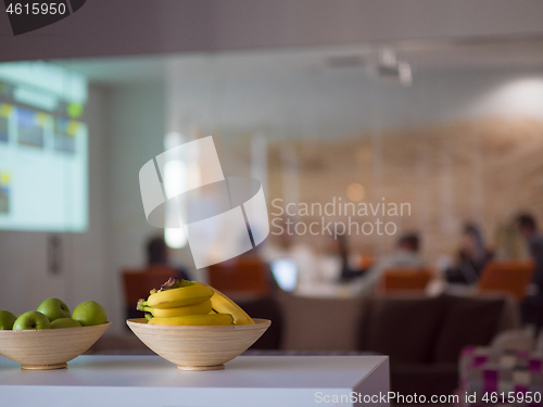 Image of Two bowl with with bananas and apples