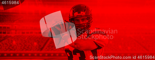 Image of duo toned american football player in  arena at night