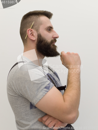 Image of portrait of bearded hipster handyman