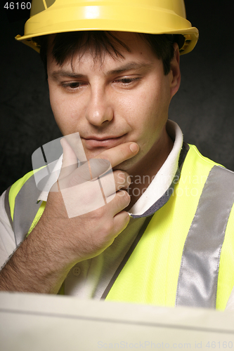 Image of Miner reading a map