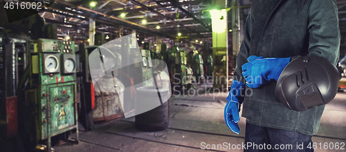 Image of Worker welder at factory