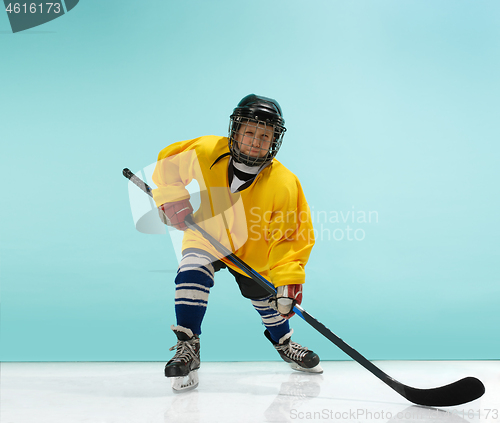 Image of A hockey player with equipment over a blue background