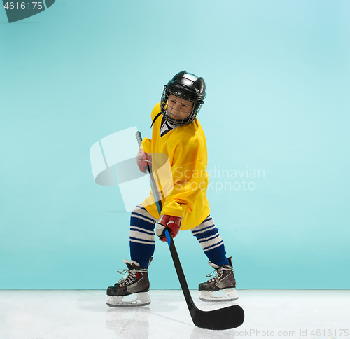 Image of A hockey player with equipment over a blue background