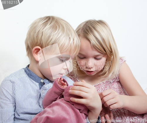 Image of Portrait of a brother and sister in studio