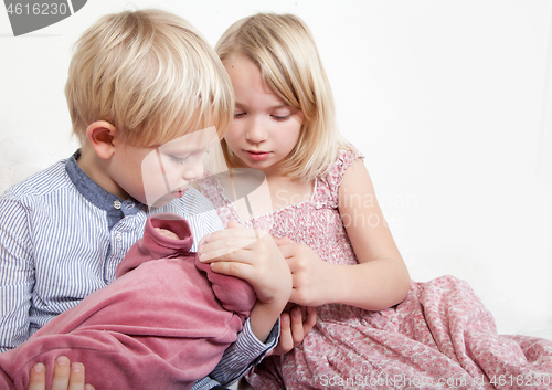 Image of Portrait of a brother and sister in studio