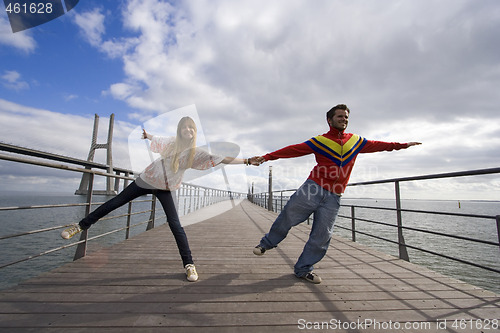 Image of Young couple outdoor enjoying life