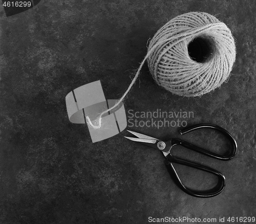 Image of Ball of twine with traditional flower scissors 