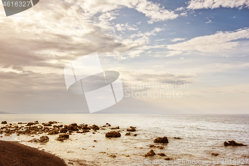 Image of a dark sand beach in northern Bali Indonesia