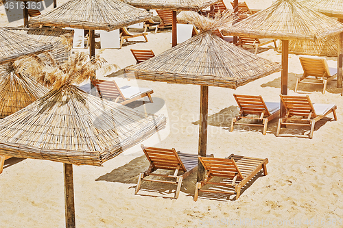 Image of Beach Umbrellas and Lounge Chairs