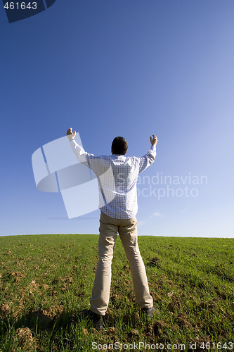 Image of outstretched to the blue sky