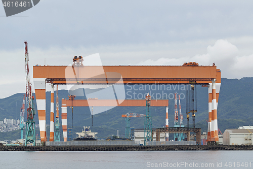 Image of Two huge shipbuilding Gantry Cranes at the shipyard