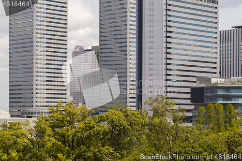 Image of Modern architecture. Modern steel and glass skyscrapers in Osaka.