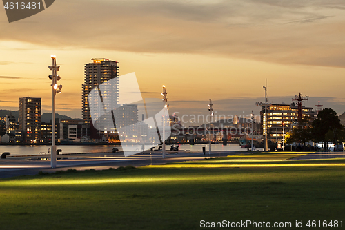 Image of Nagasaki Seaside Park near Dejima wharf shopping and restaurant area , Japan. at sunset