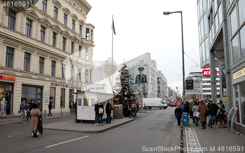 Image of Berlin, Germany - December 20, 2019: People visit famous Checkpo