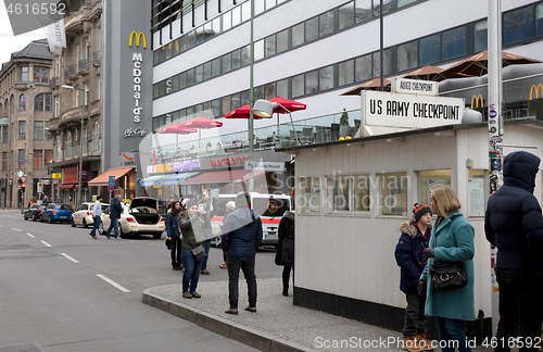 Image of Berlin, Germany - December 20, 2019: People visit famous Checkpo