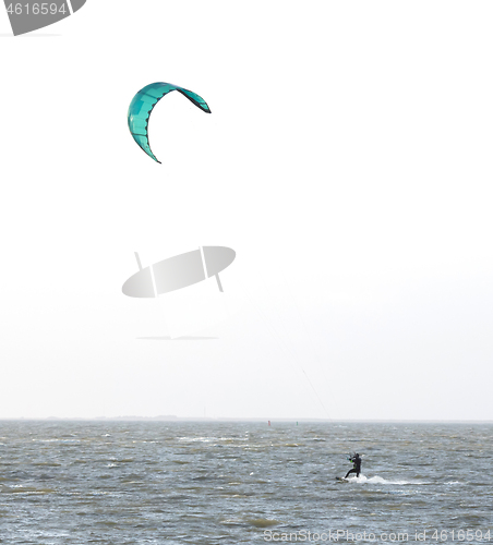 Image of Kitesurfing on the waves