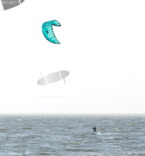 Image of Kitesurfing on the waves