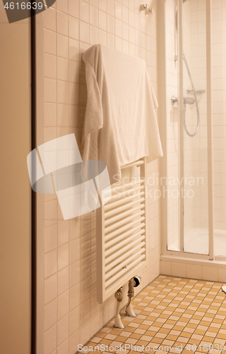 Image of Heated towel rack in an old bathroom