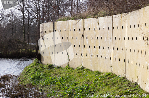 Image of Wall with holes, nests for swallows