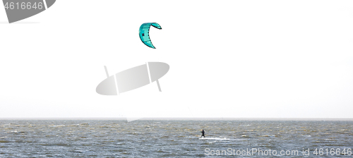 Image of Kitesurfing on the waves