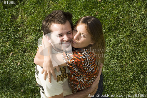 Image of Young couple outdoor enjoying life