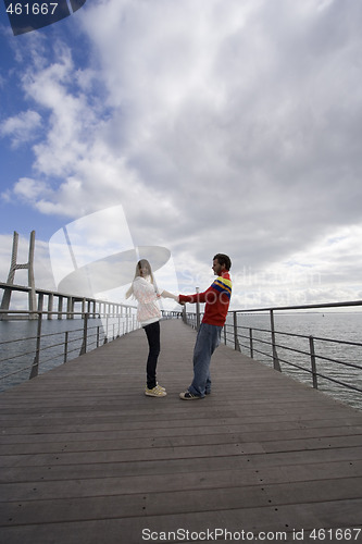 Image of Young couple outdoor enjoying life