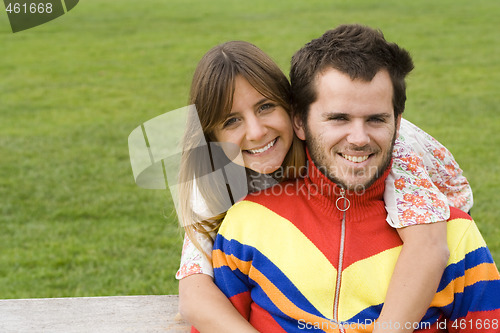 Image of Young couple outdoor enjoying life