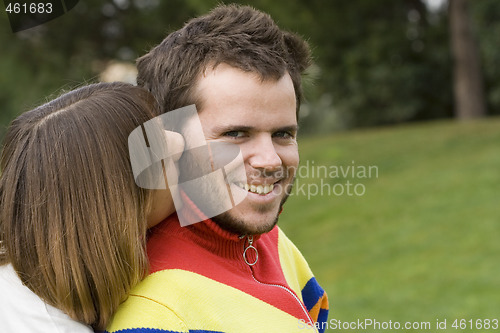 Image of Young couple outdoor enjoying life