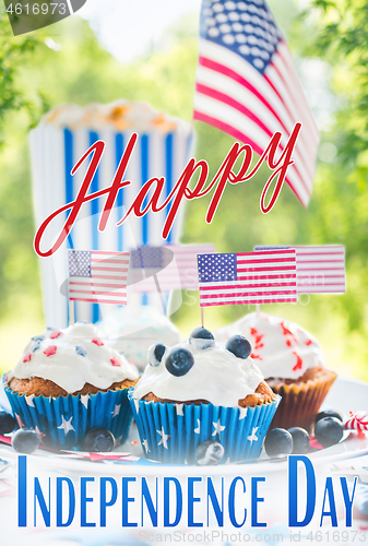 Image of cupcakes with american flags on independence day