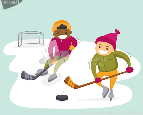 Image of Multiethnic boys playing hockey on outdoor rink.