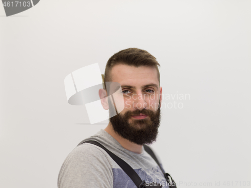 Image of portrait of bearded hipster handyman