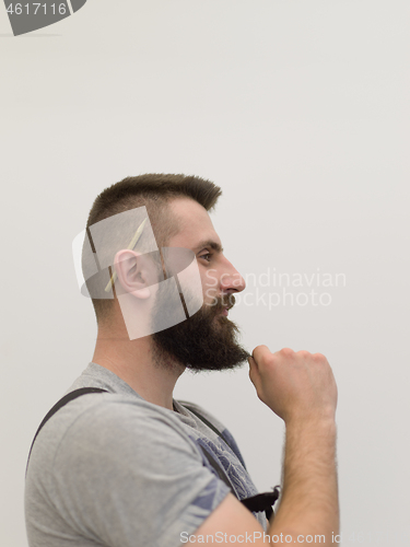 Image of portrait of bearded hipster handyman