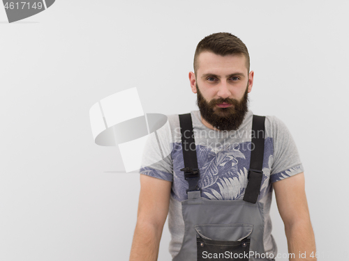 Image of portrait of bearded hipster handyman isolated on white