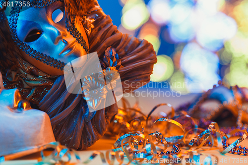 Image of Traditional female carnival venetian mask on bokeh background. Masquerade, Venice, Mardi Gras, Brazil concept