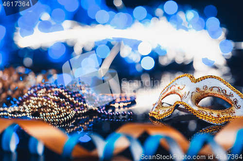 Image of Traditional female carnival venetian mask on bokeh background. Masquerade, Venice, Mardi Gras, Brazil concept