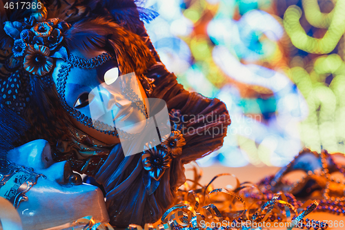 Image of Traditional female carnival venetian mask on bokeh background. Masquerade, Venice, Mardi Gras, Brazil concept