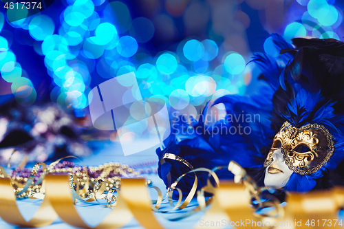 Image of Traditional female carnival venetian mask on bokeh background. Masquerade, Venice, Mardi Gras, Brazil concept