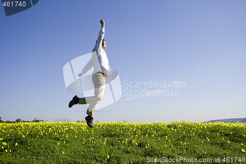 Image of man jumping high to sucess